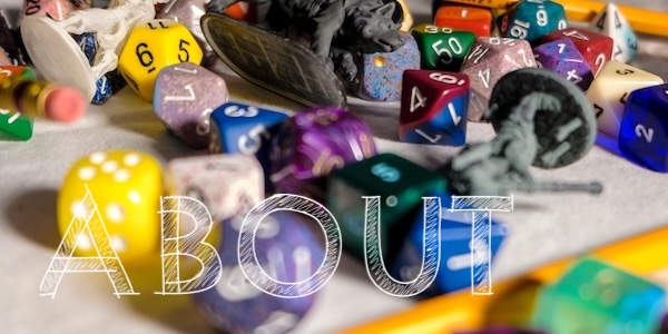 Close up of dice, pencils, rpg miniatures.