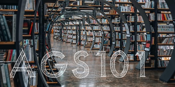 Photo of metal library shelves with books.